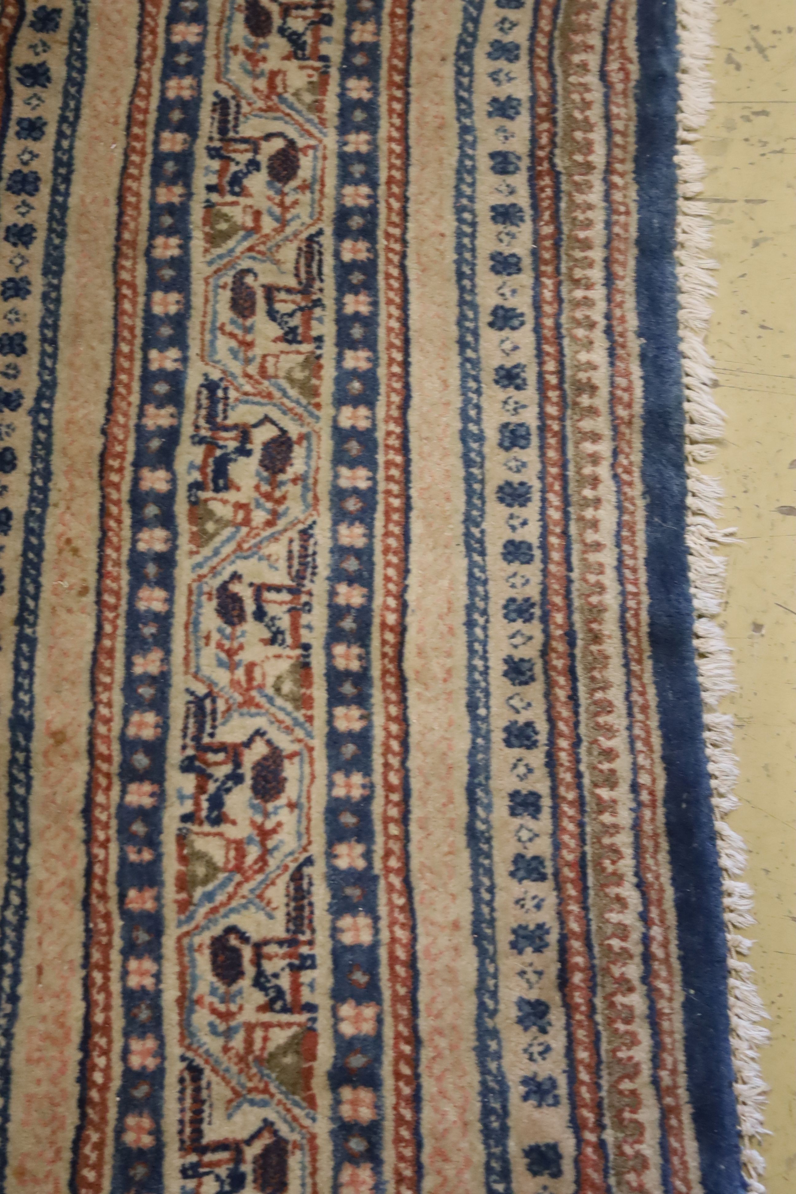 A Tabriz blue ground carpet